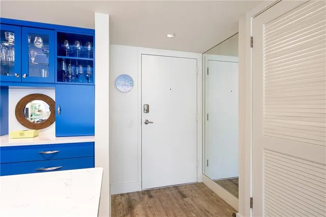 a view of entryway with wooden floor