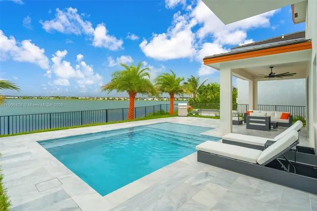 a view of a backyard with a garden and plants