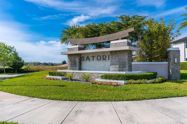 a view of a city with tall buildings in the background