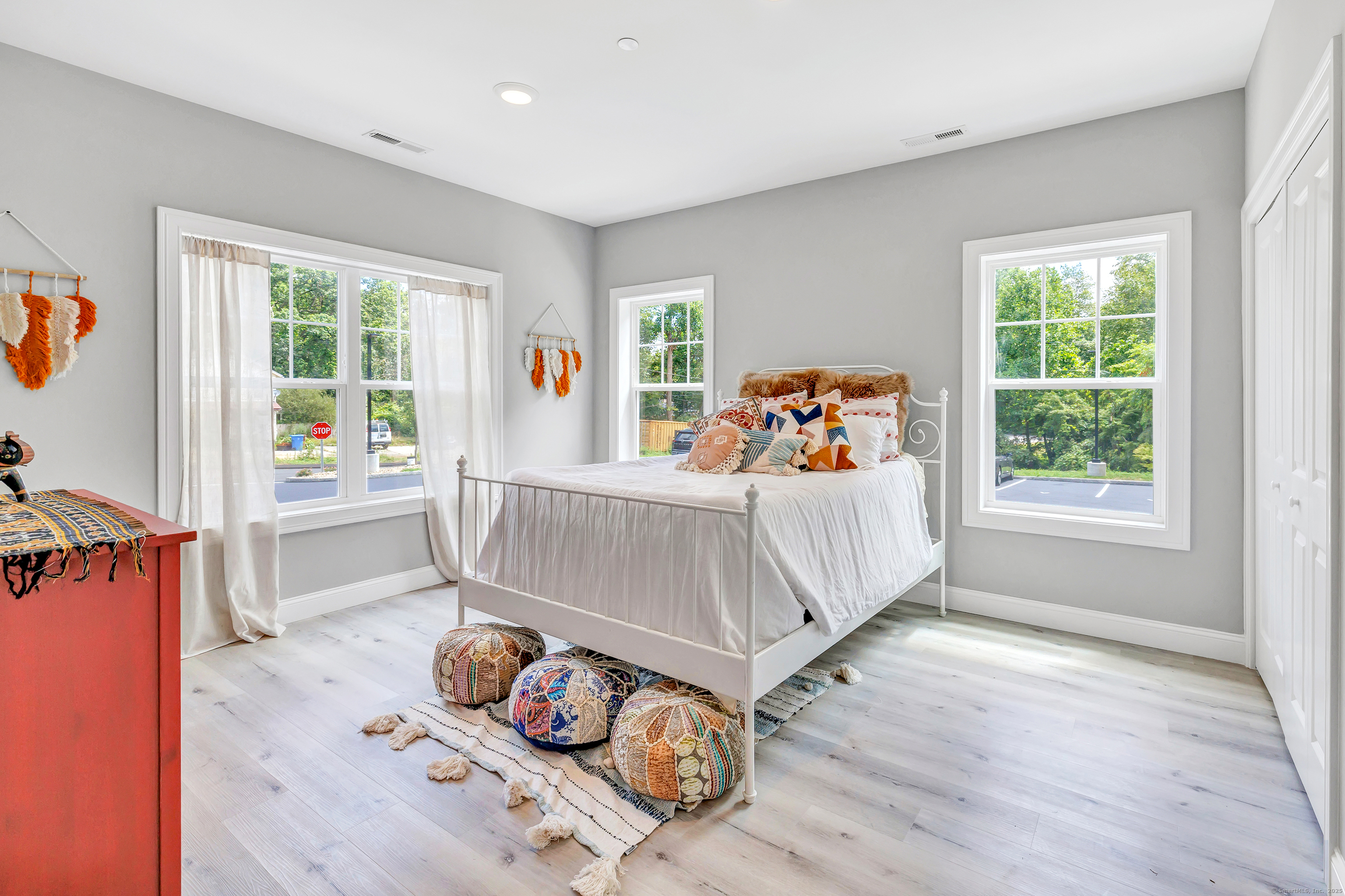 303 Bridgeport Avenue, Unit 205 Shelton, CT 06484 - Photo 19 of 36 a bedroom with furniture and a window