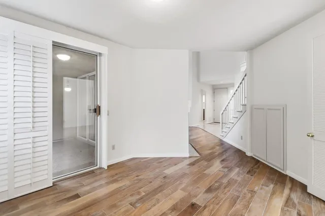 an empty room with sliding door