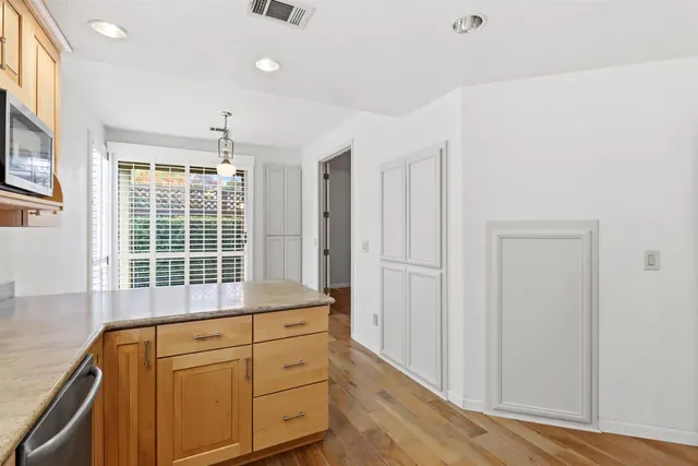 a view of livingroom with furniture and wooden floor