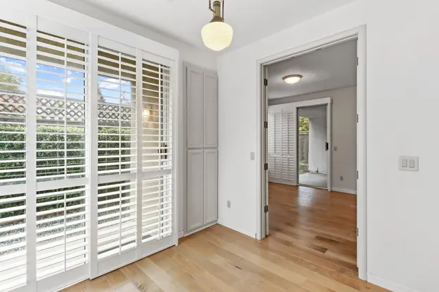 a kitchen with a stove a sink and a refrigerator