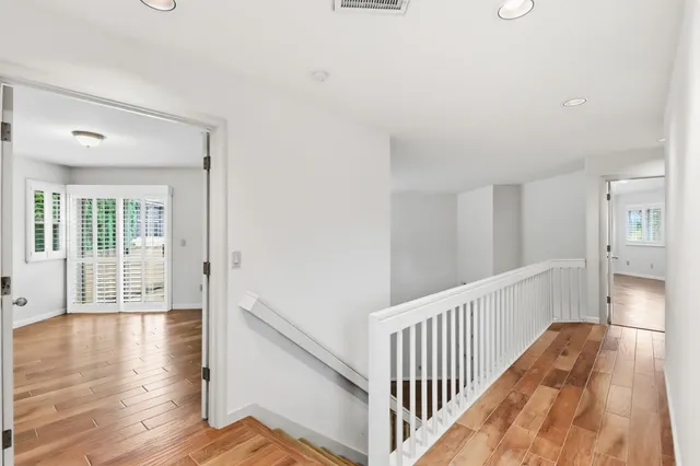 a bathroom with a shower and toilet