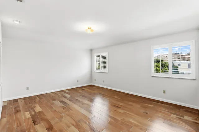 a bathroom with a sink double vanity and a mirror