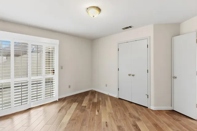 a view of a house with a street