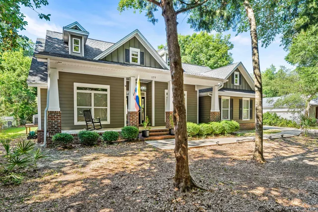 a front view of a house with a porch