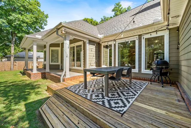 a view of swimming pool with outdoor seating