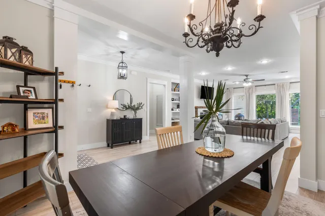 a living room with furniture fireplace and a flat screen tv