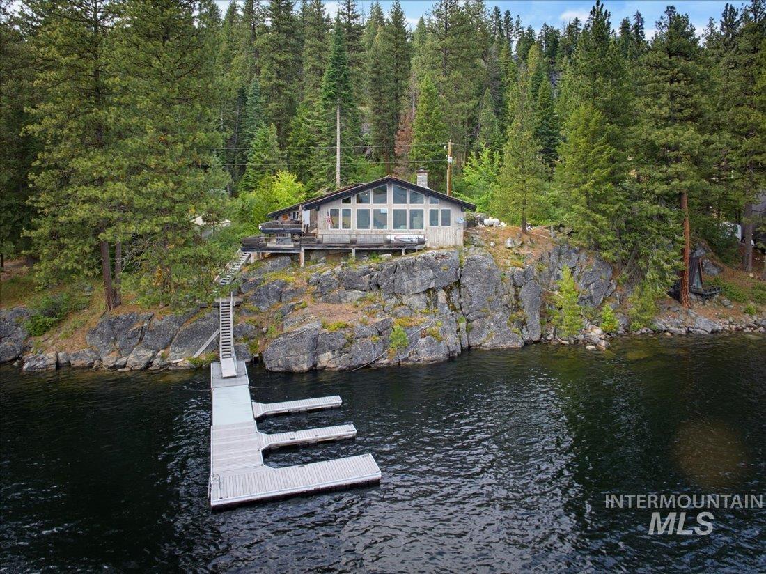 3800 Warren Wagon Road McCall, ID 83638 - Photo 46 of 50 Waterfront property featuring a private dock with multiple slips, a dedicated stairs access, and a large deck