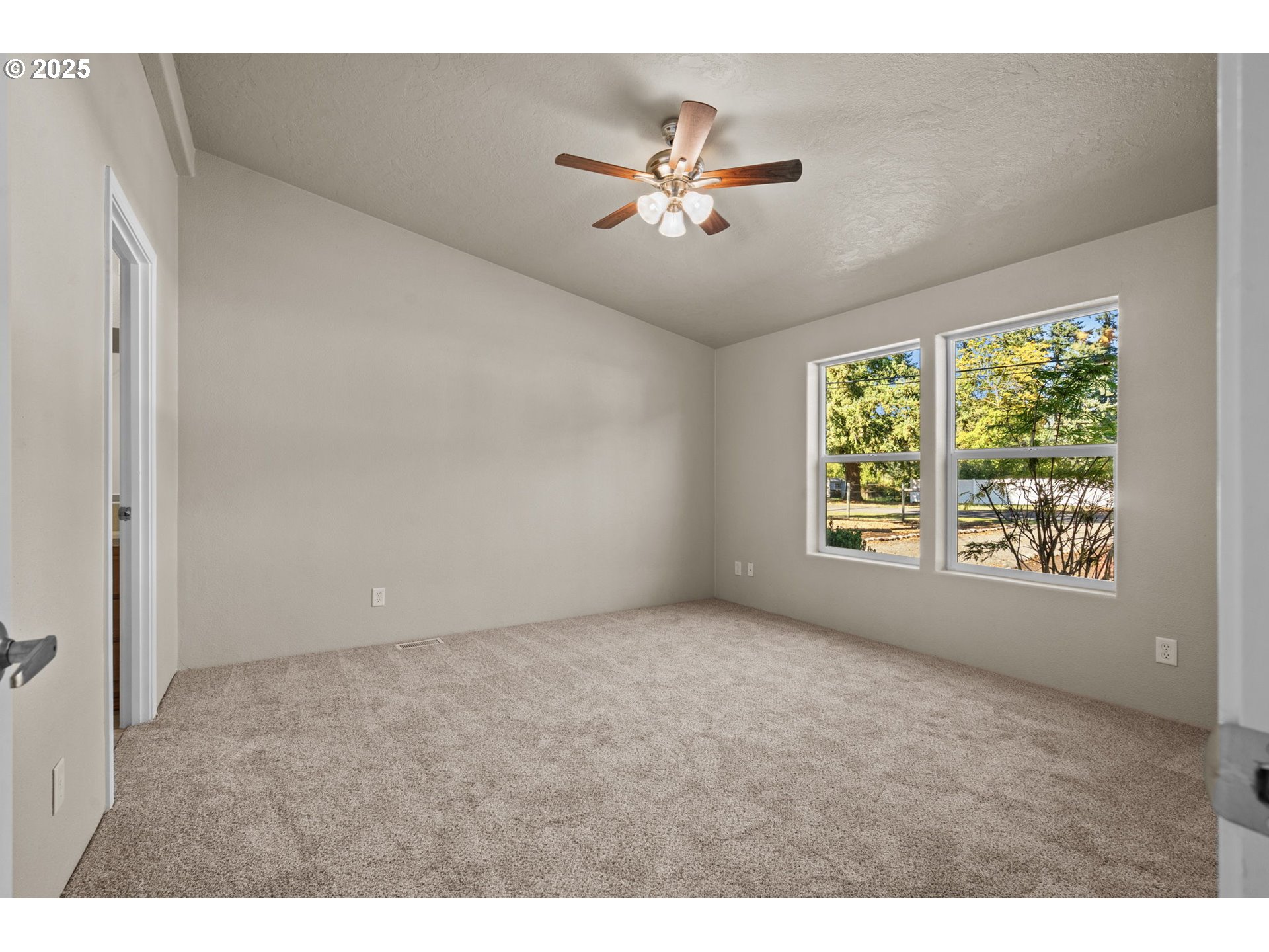 344 Southwest Ivy Street Mill City, OR 97360 - Photo 18 of 38 a view of an empty room with a window