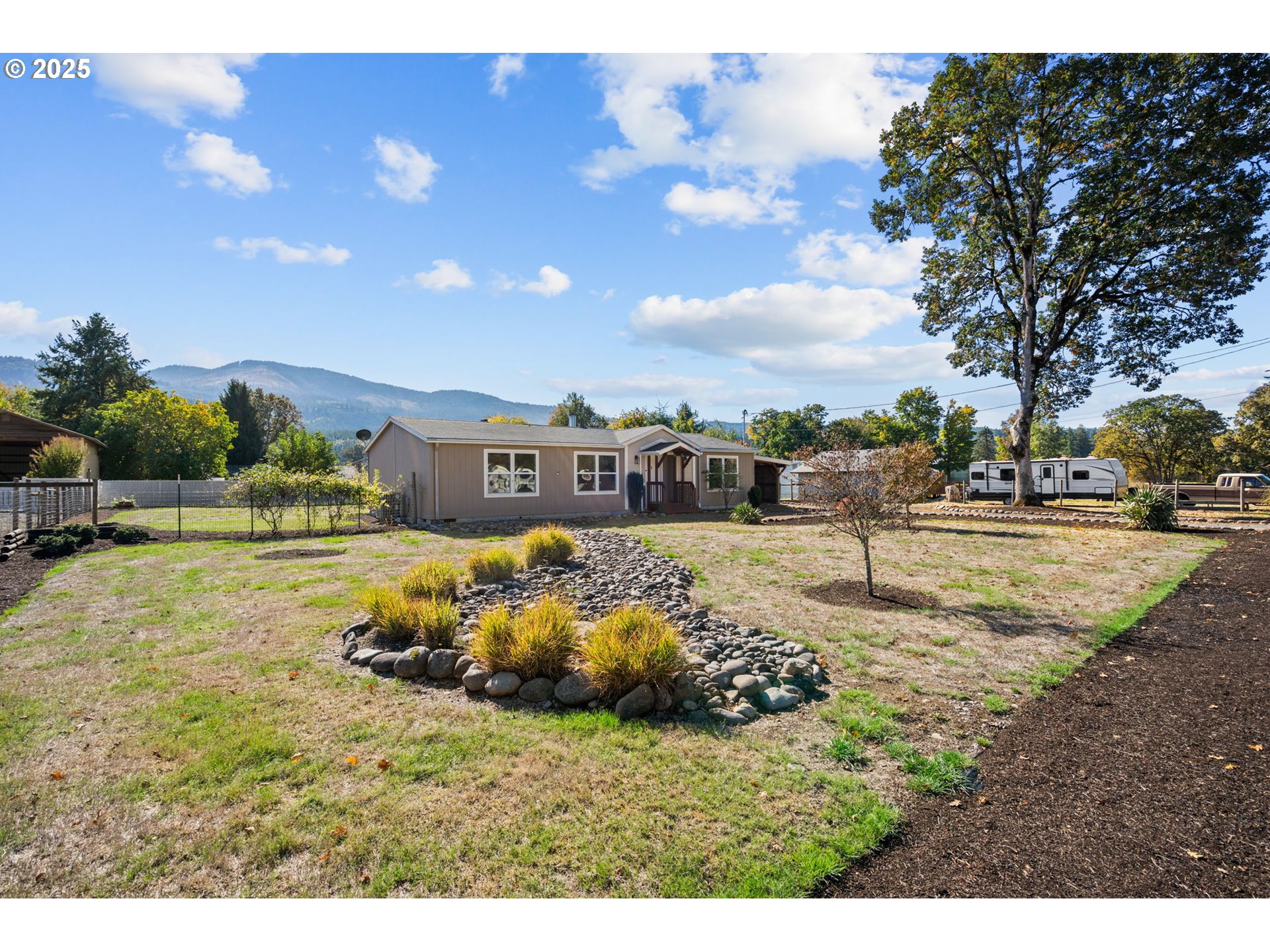 344 Southwest Ivy Street Mill City, OR 97360 - Photo 34 of 38 a park view with large trees