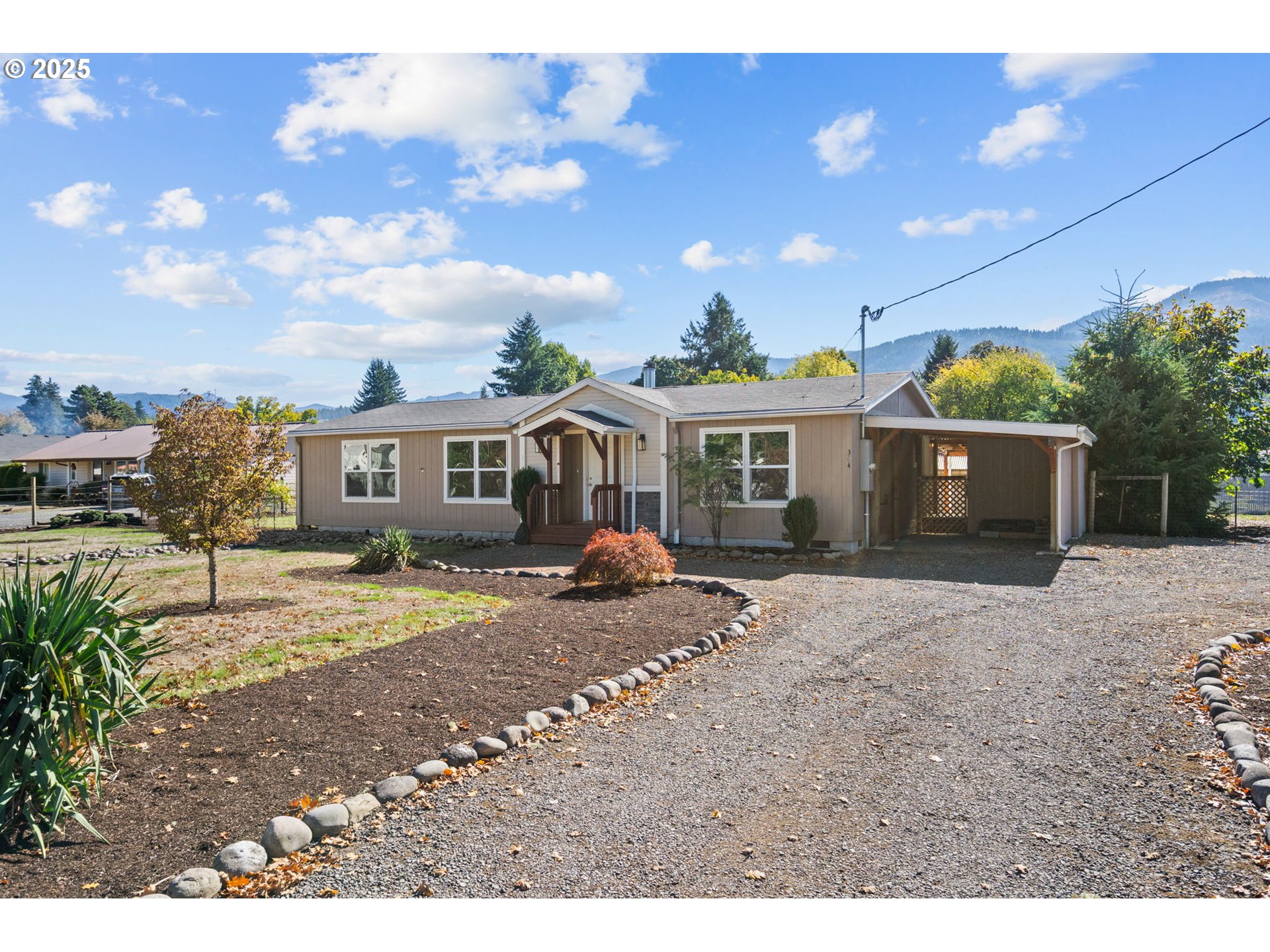 344 Southwest Ivy Street Mill City, OR 97360 - Photo 38 of 38 a front view of a house with a yard