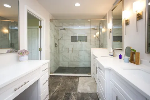 a bedroom with a bed and a cabinets