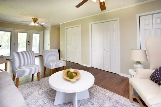 a swimming pool with trees in the background