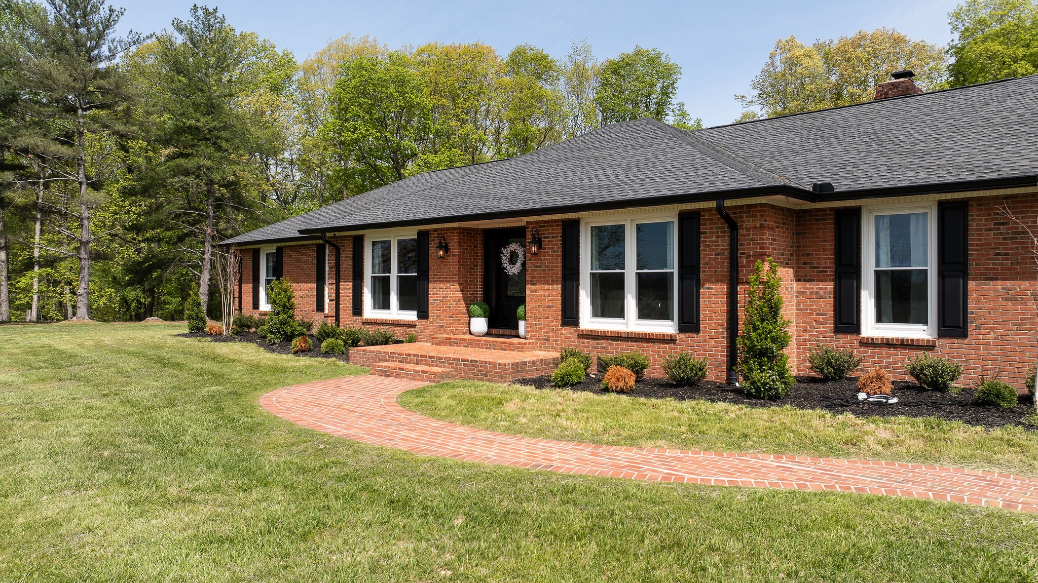 1747 Allen Ferry Road Smithville, TN 37166 - Photo 36 of 45 a front view of a house with a yard