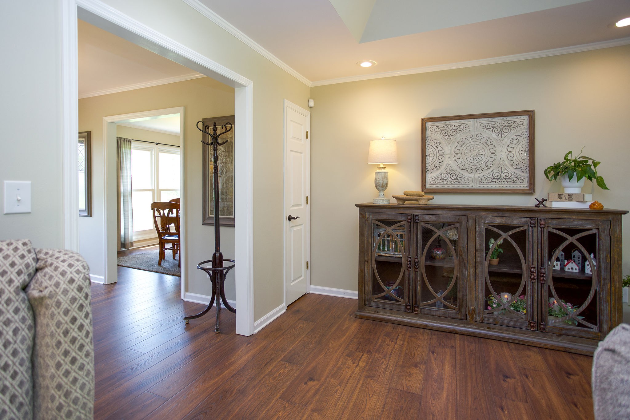 1747 Allen Ferry Road Smithville, TN 37166 - Photo 7 of 45 a view of a hallway with wooden floor fireplace and windows