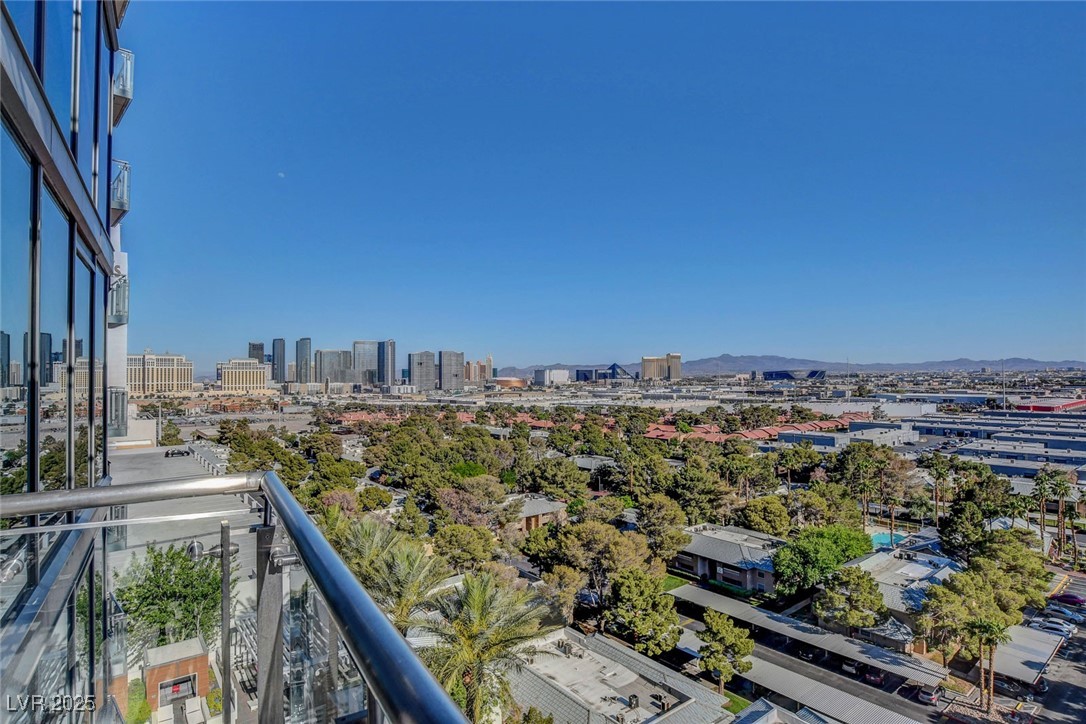 4381 West Flamingo Road, Unit 1121 Las Vegas, NV 89103 - Photo 25 of 33 Balcony featuring a city view