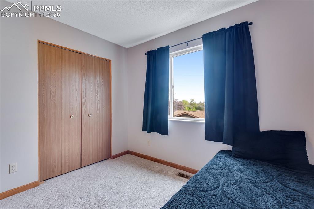 110 Monk Street Colorado Springs, CO 80911 - Photo 25 of 34 a view of an empty room and window
