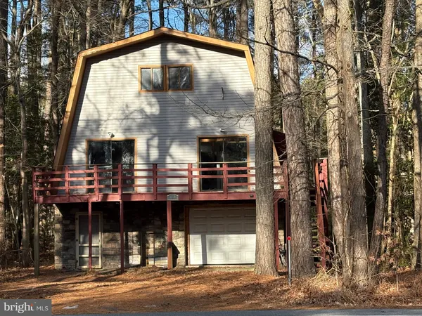 a front view of a house with a porch