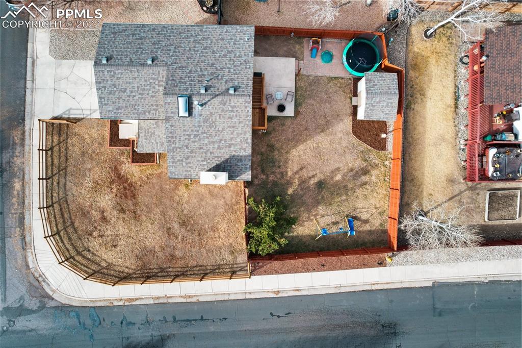 5805 Dutchess Drive Colorado Springs, CO 80923 - Photo 34 of 34 an aerial view of a house