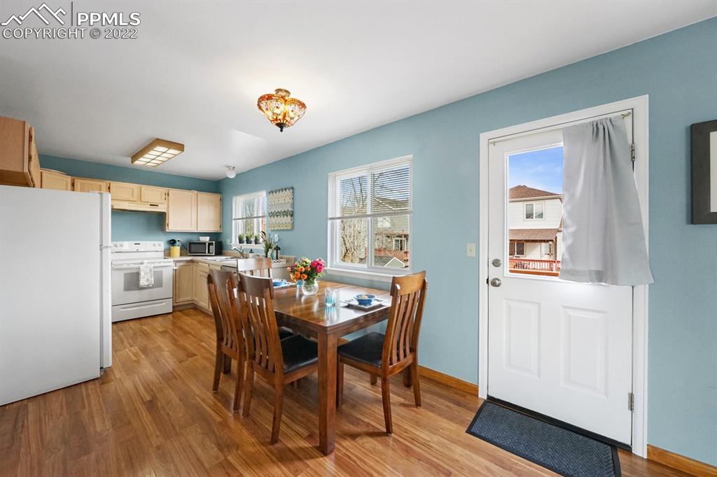 5805 Dutchess Drive Colorado Springs, CO 80923 - Photo 7 of 34 a dining room with furniture and window