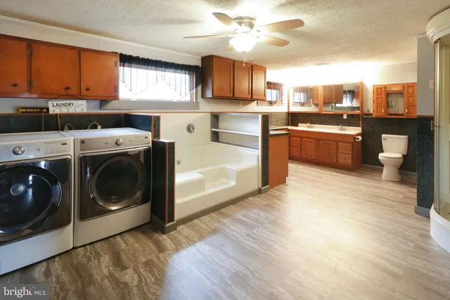 a view of a bathroom from the hallway