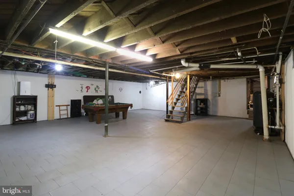 a view of a door with wooden floor