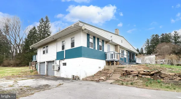 a view of a yard with trees