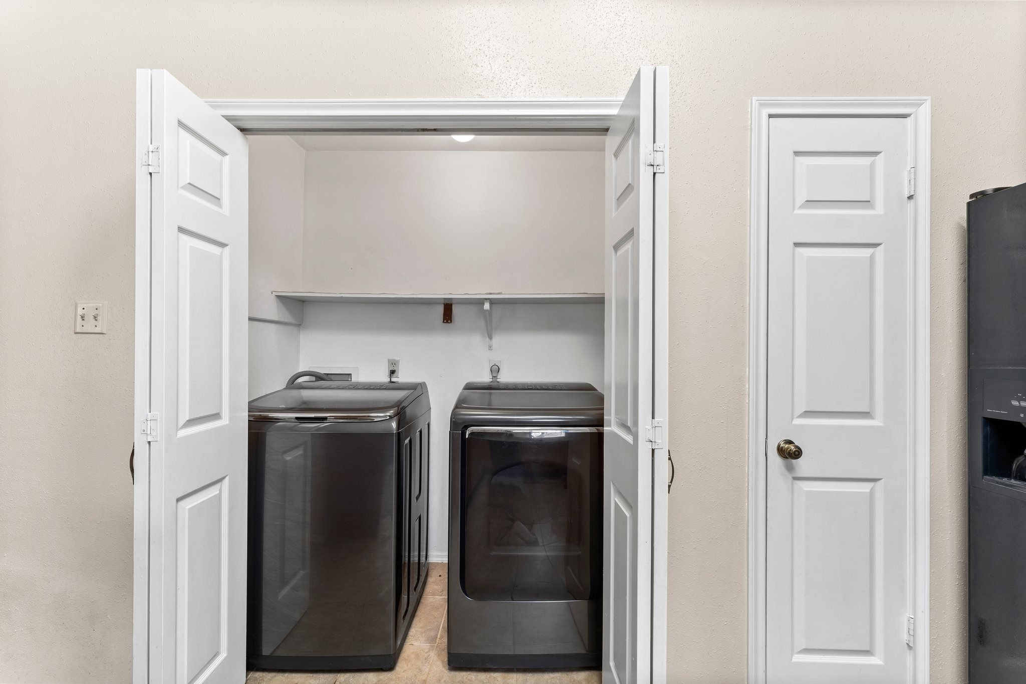 2110 Creston Drive Spring, TX 77386 - Photo 19 of 50 a utility room with dryer and washer