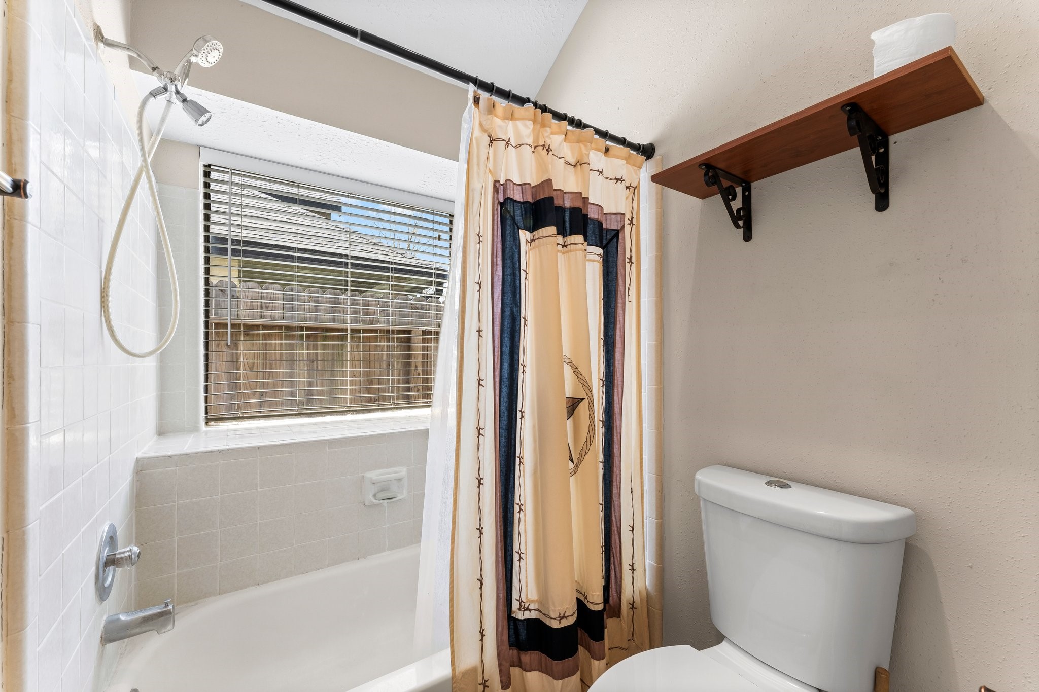 2110 Creston Drive Spring, TX 77386 - Photo 23 of 50 a bathroom with a toilet and a shower