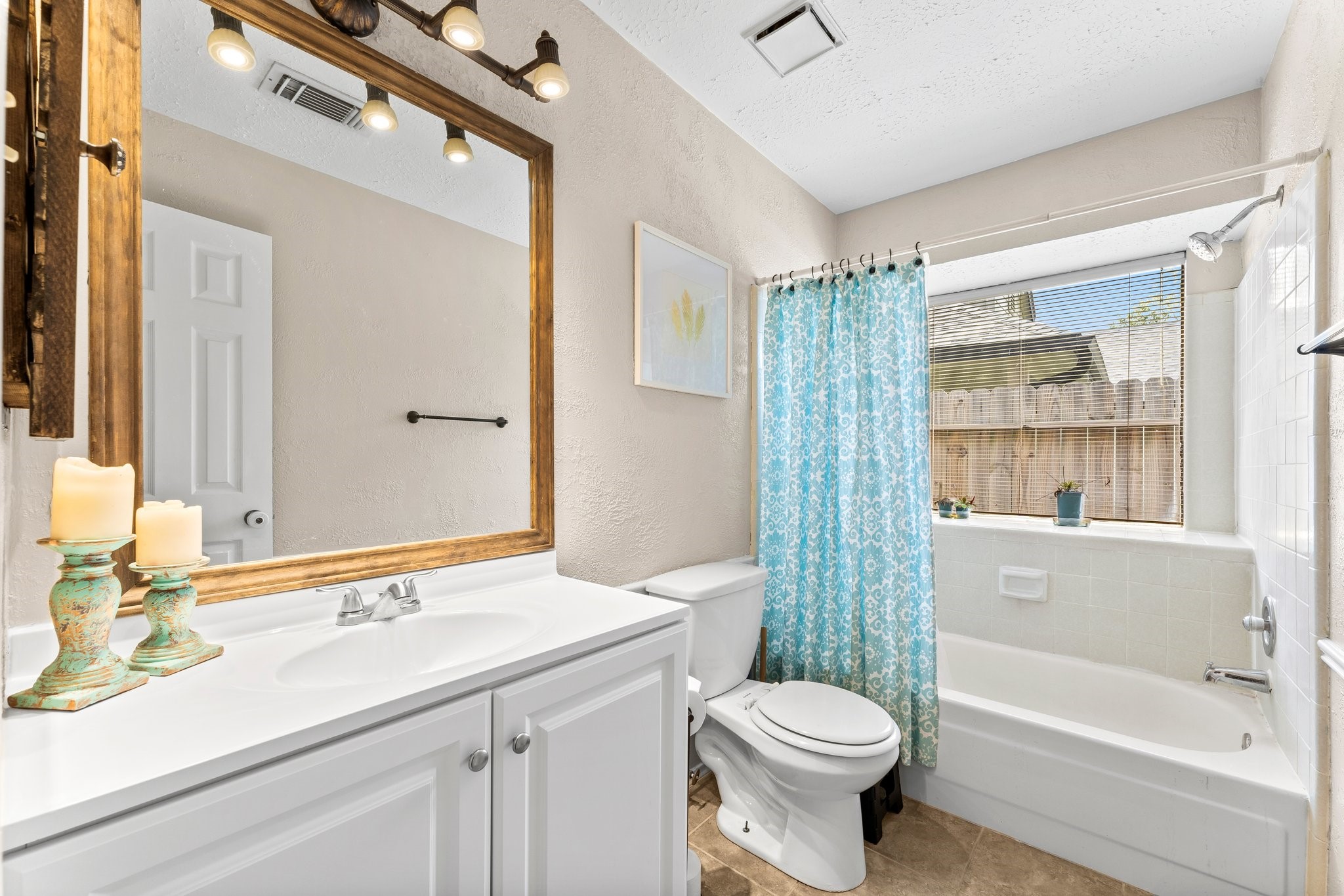 2110 Creston Drive Spring, TX 77386 - Photo 24 of 50 a bathroom with a sink a toilet and shower