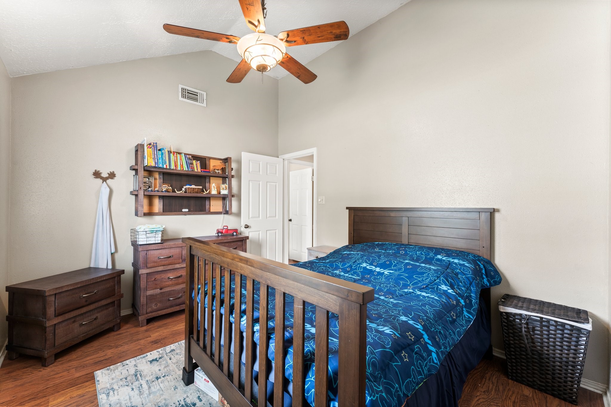 2110 Creston Drive Spring, TX 77386 - Photo 26 of 50 a bedroom with a bed and cabinets