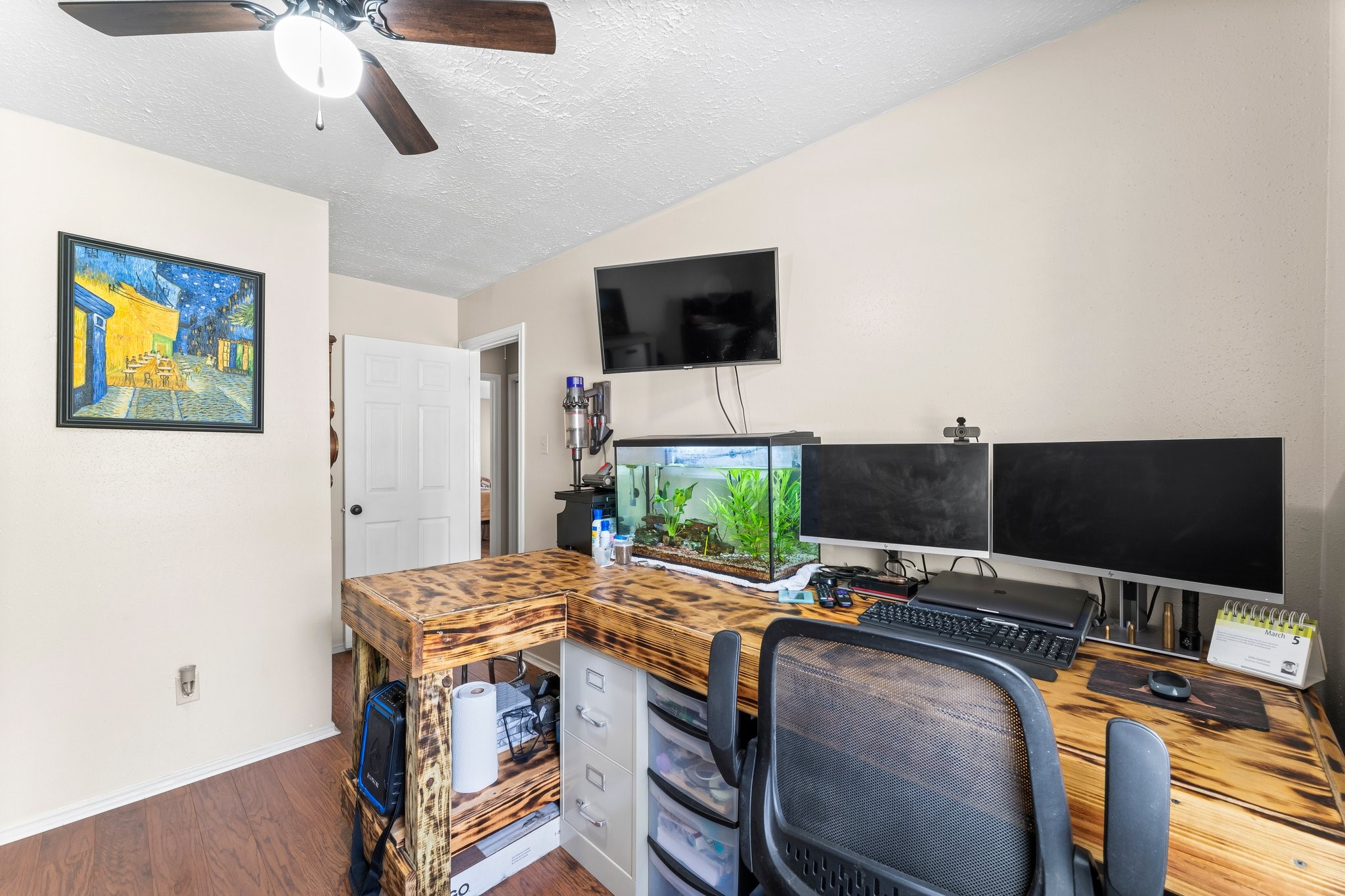 2110 Creston Drive Spring, TX 77386 - Photo 28 of 50 a view of a livingroom with workspace and a flat screen tv
