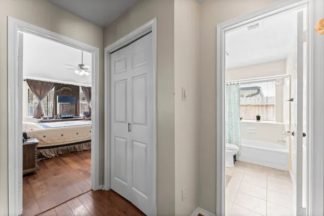a view of a bedroom from a hallway