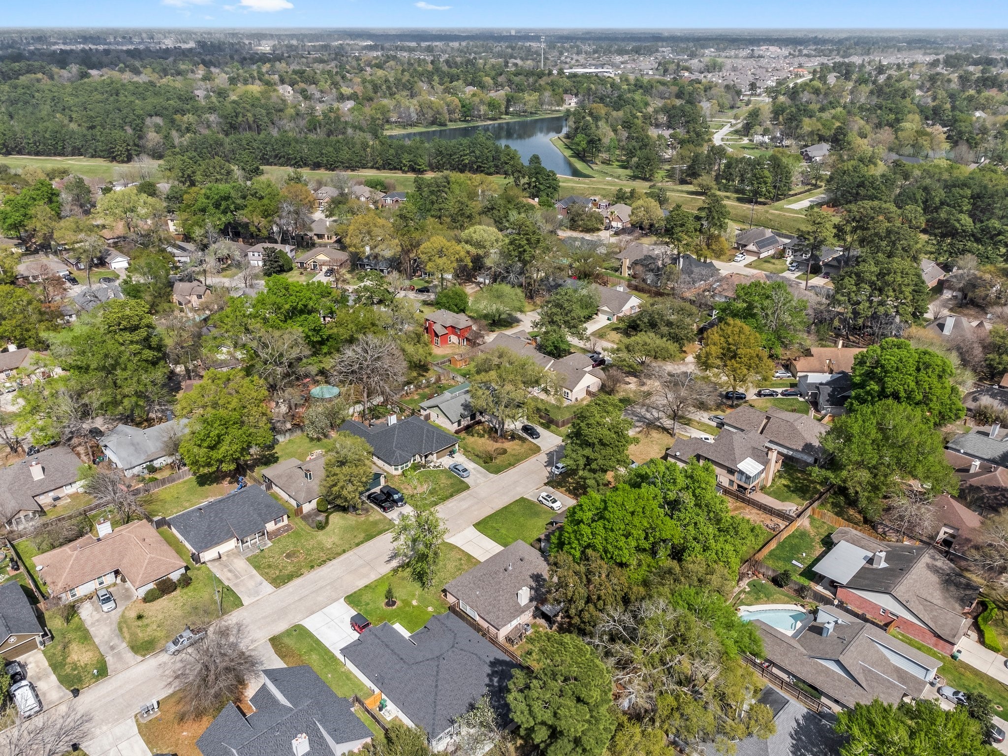 2110 Creston Drive Spring, TX 77386 - Photo 38 of 50 an aerial view of residential houses with outdoor space and trees
