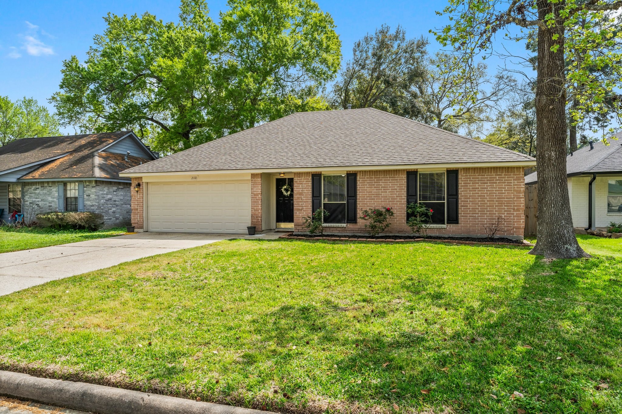 2110 Creston Drive Spring, TX 77386 - Photo 41 of 50 a view of a house with a yard