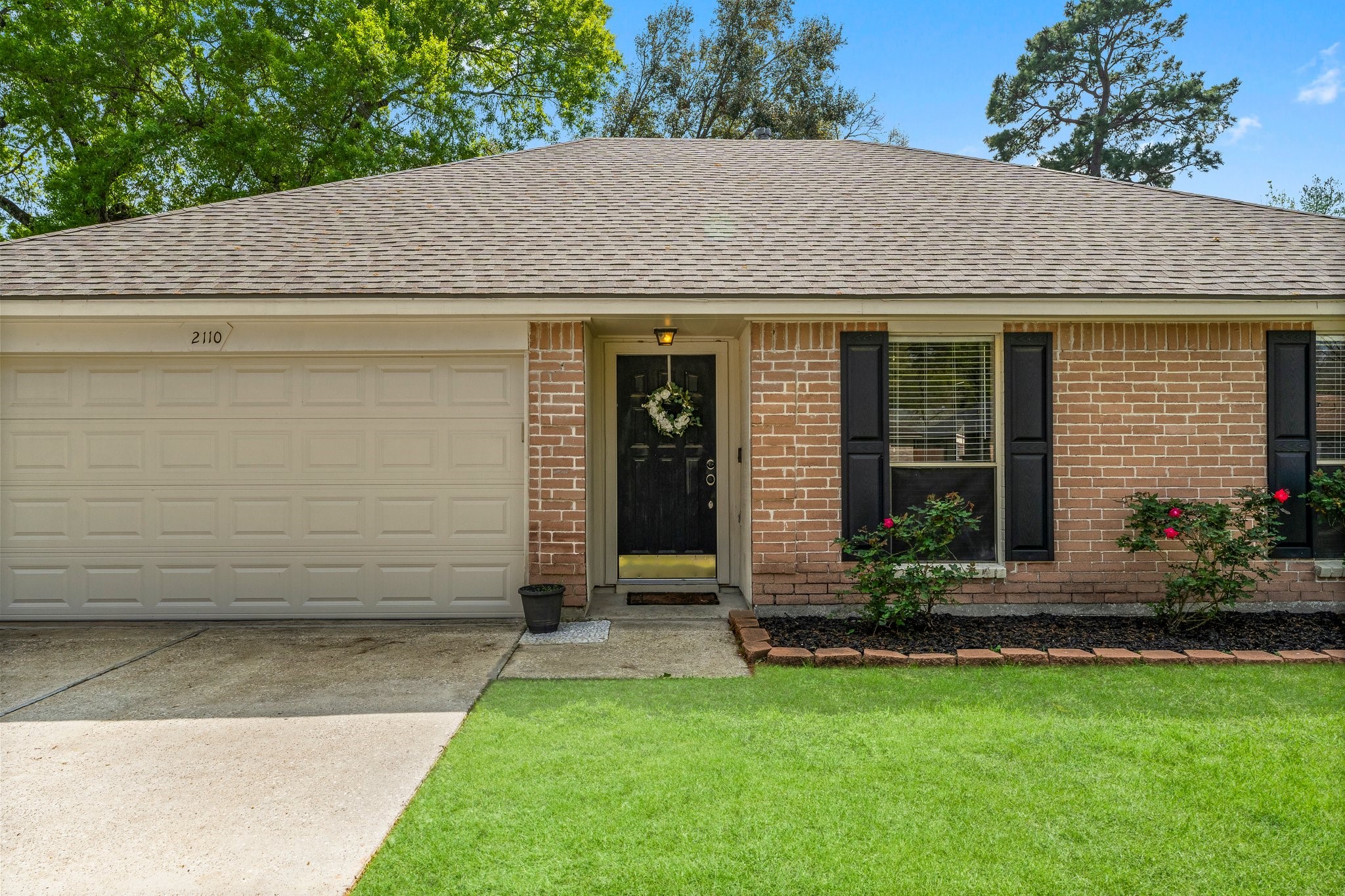 2110 Creston Drive Spring, TX 77386 - Photo 6 of 50 a view of a house with garden