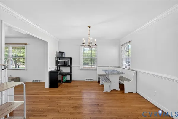 a bedroom with furniture and window