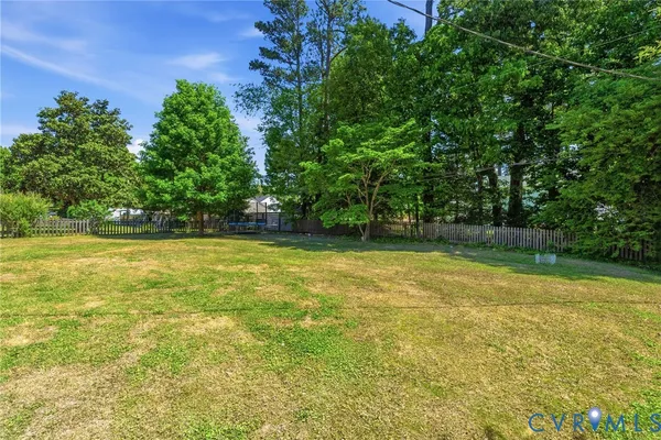 a view of a yard with a trees