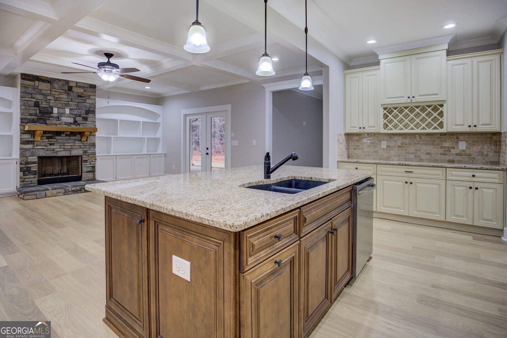 284 Sowell Road McDonough, GA 30252 - Photo 15 of 48 a kitchen with granite countertop a sink and cabinets