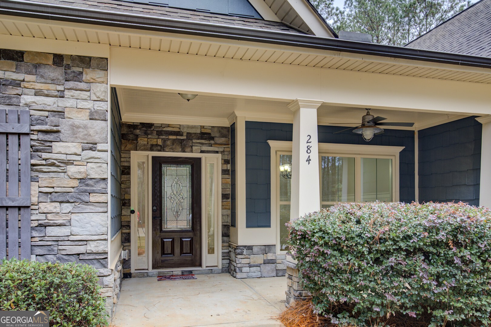 284 Sowell Road McDonough, GA 30252 - Photo 2 of 48 a front view of a house with a porch