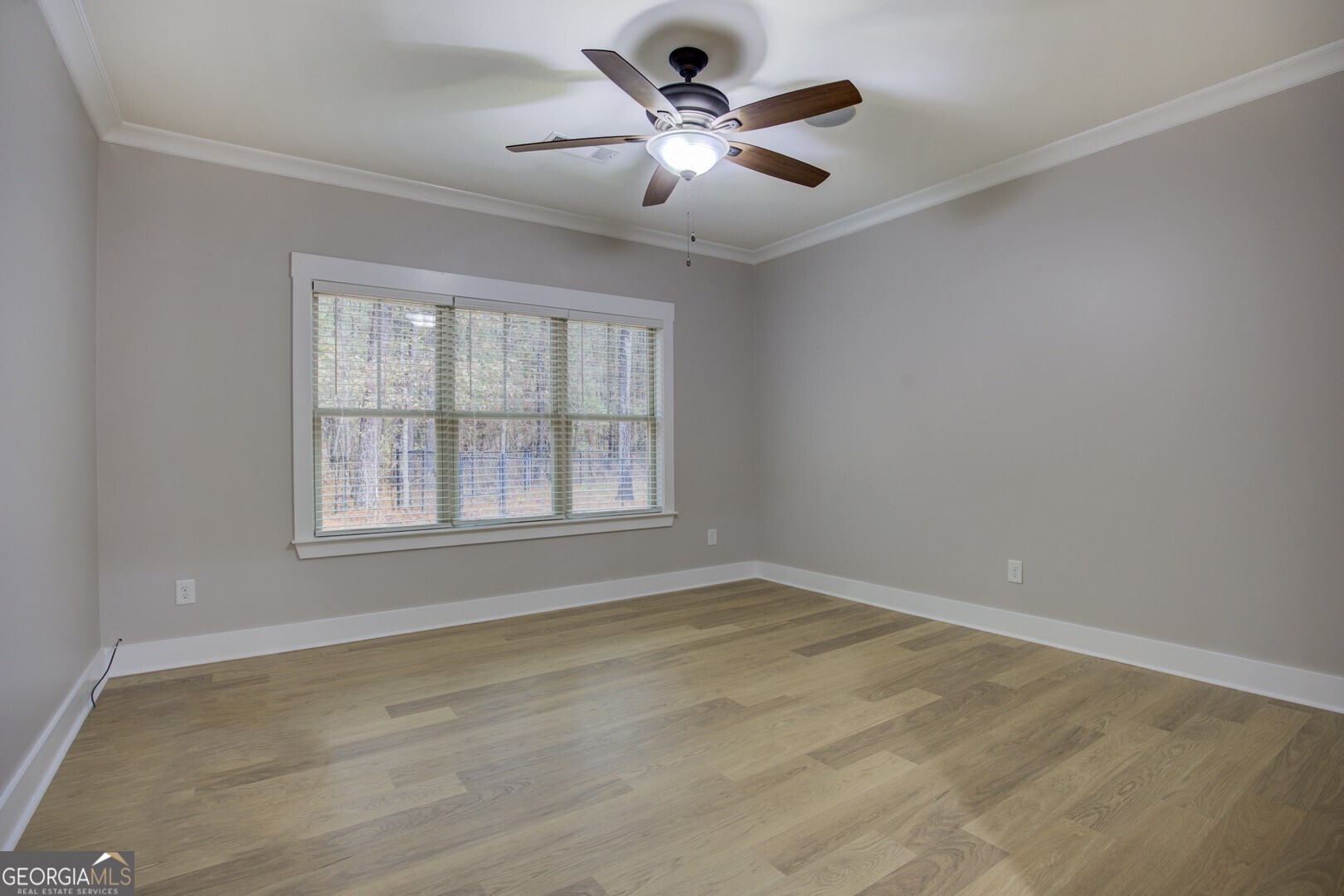 284 Sowell Road McDonough, GA 30252 - Photo 23 of 48 a view of an empty room with a window