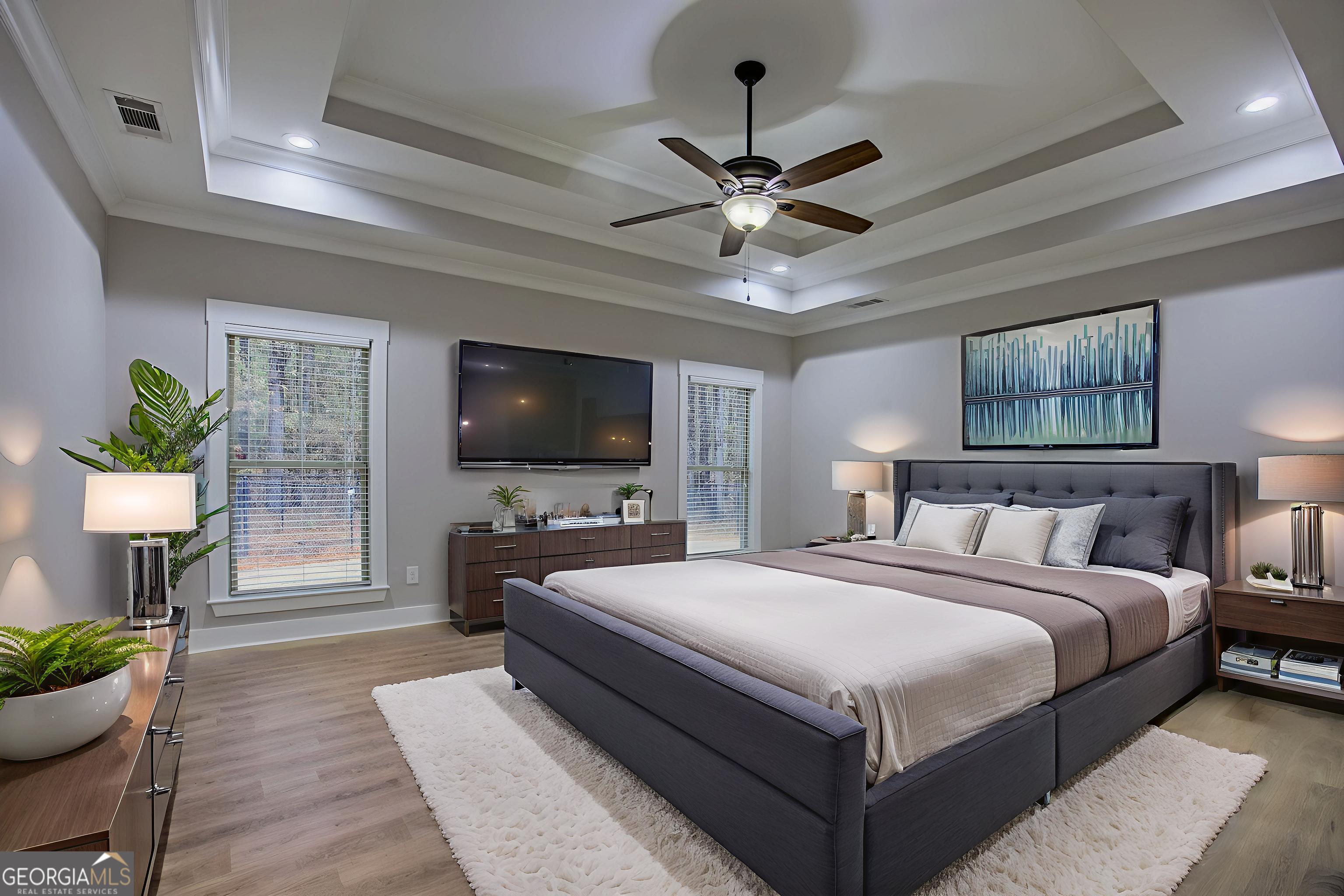 284 Sowell Road McDonough, GA 30252 - Photo 28 of 48 a bedroom with a bed and a chandelier