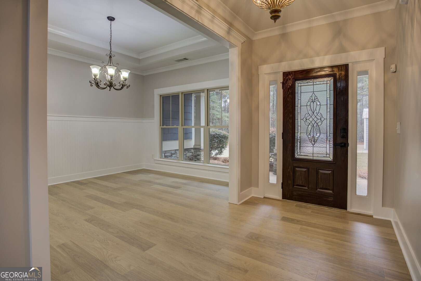 284 Sowell Road McDonough, GA 30252 - Photo 3 of 48 a view of an entryway with wooden floor