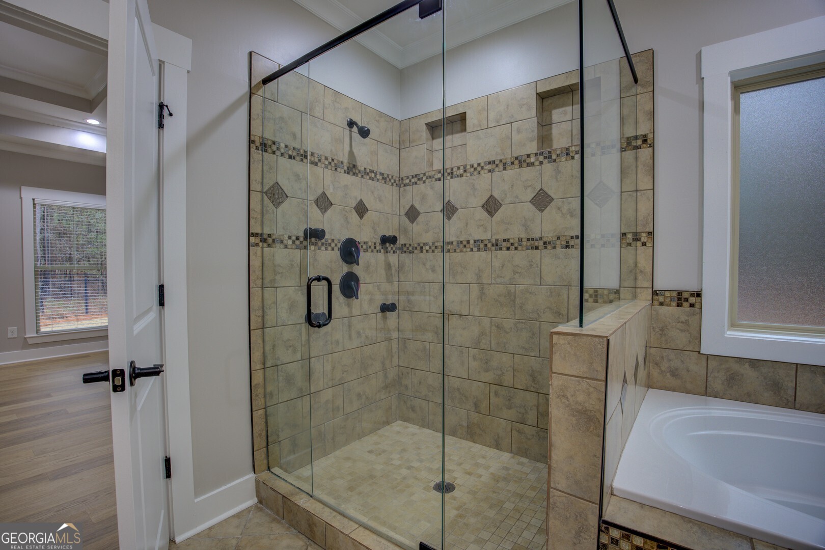 284 Sowell Road McDonough, GA 30252 - Photo 34 of 48 a bathroom with a shower and a sink