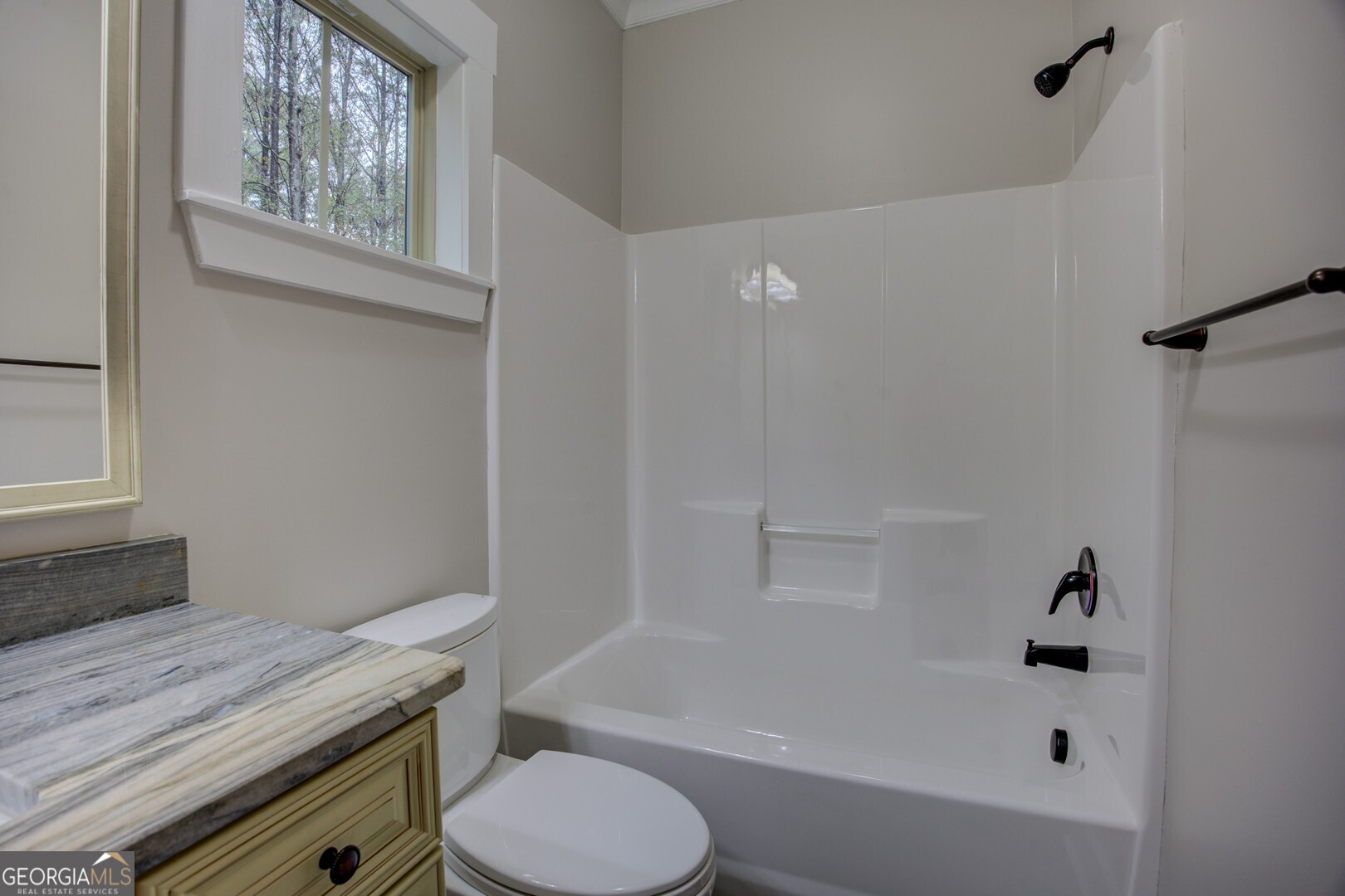 284 Sowell Road McDonough, GA 30252 - Photo 37 of 48 a bathroom with a sink a toilet and bathtub