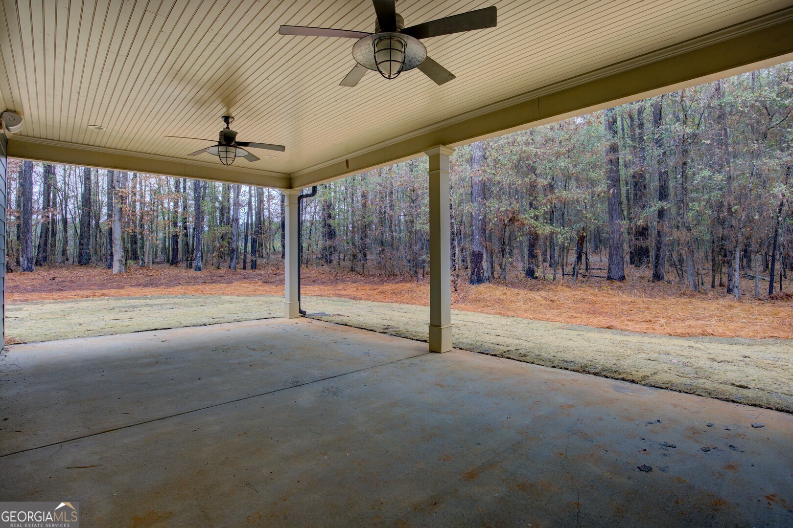 284 Sowell Road McDonough, GA 30252 - Photo 41 of 48 a view of basketball room with floor to ceiling windows