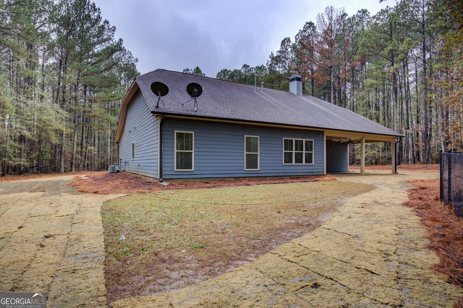 284 Sowell Road McDonough, GA 30252 - Photo 42 of 48 a front view of a house with a yard