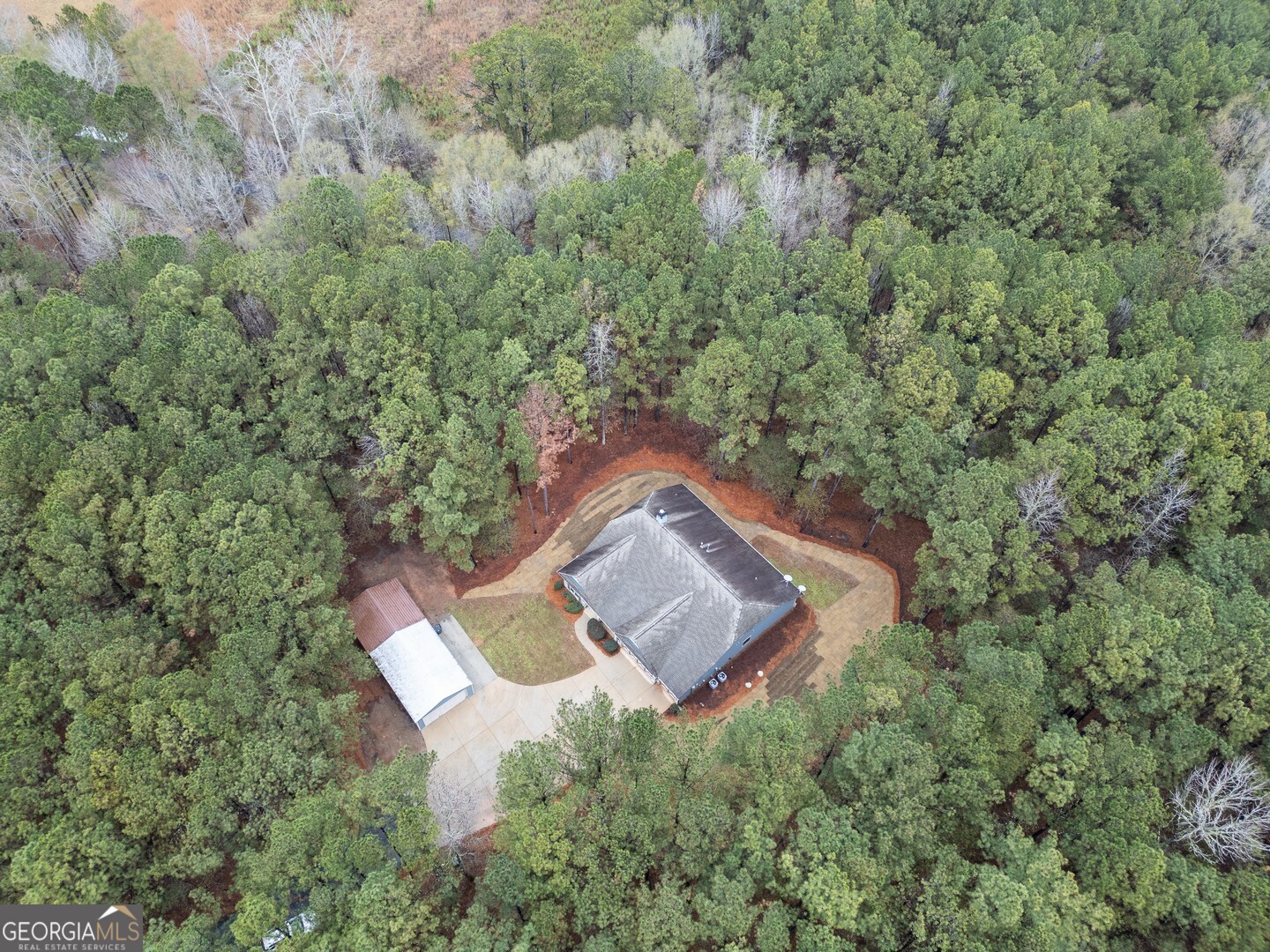 284 Sowell Road McDonough, GA 30252 - Photo 46 of 48 an aerial view of a house with a yard and lake view